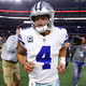 Dak Prescott #4 of the Dallas Cowboys leaves the field after losing to the Philadelphia Eagles 37-9 at AT&T Stadium on November 19, 2017 in Arlington, Texas.